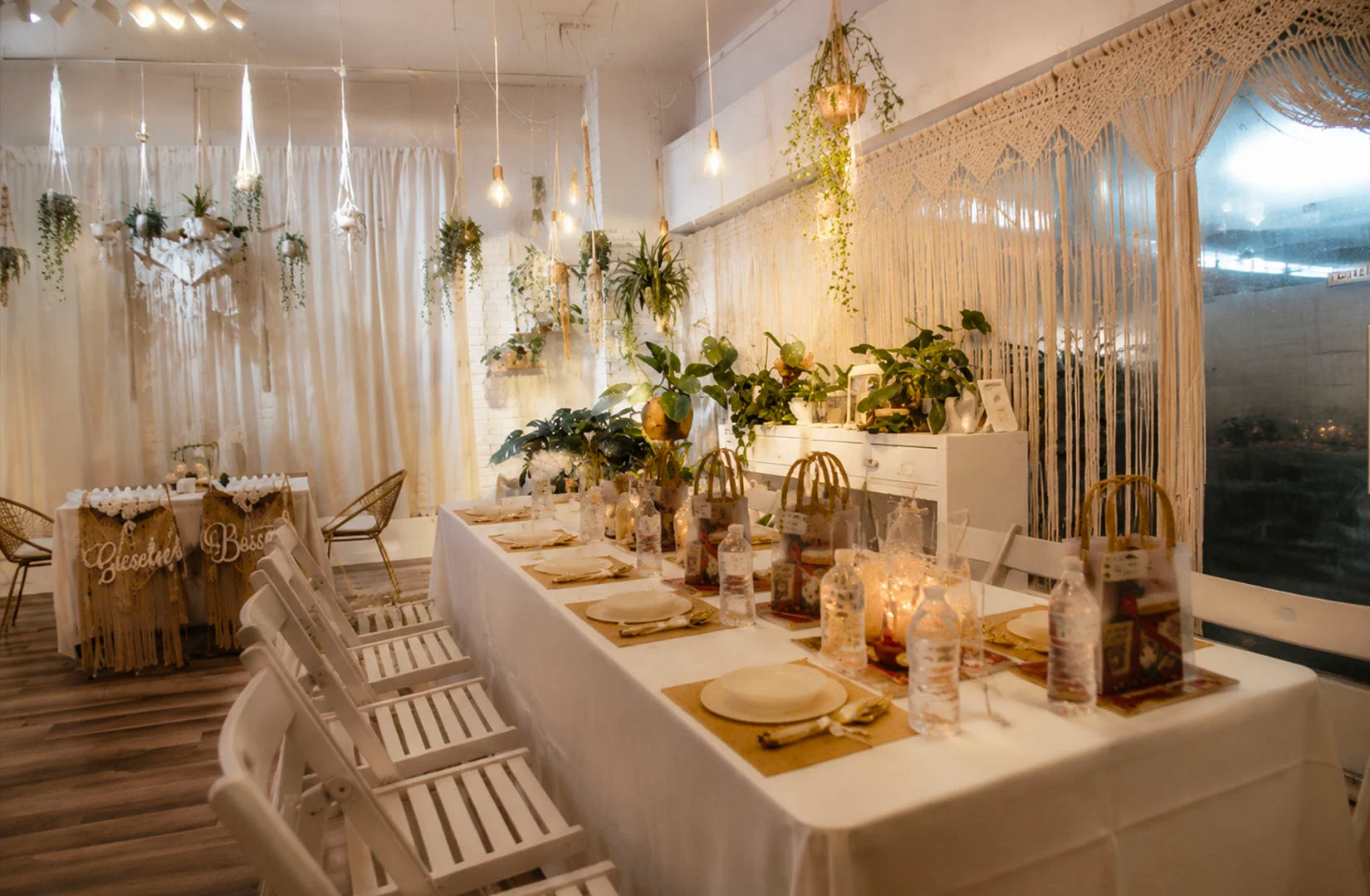Bright white private dining area with floral decorations