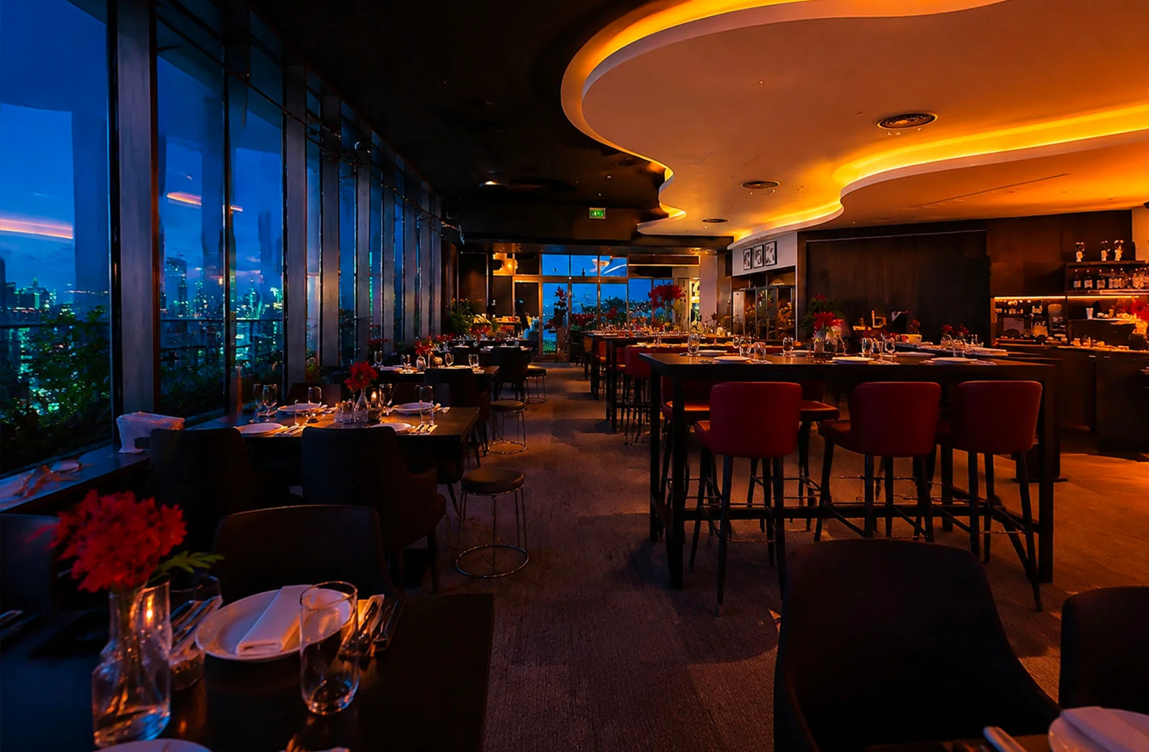 Elegant restaurant interior with city view and warm lighting