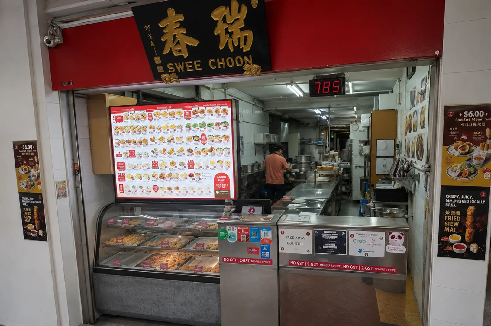 Swee Choon dim sum stall with red sign and digital menu