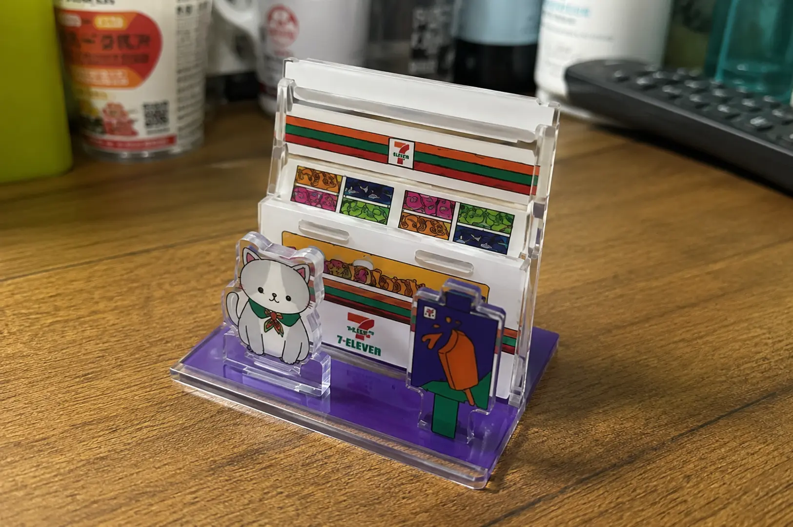 Close-up of a 7-Eleven Mini-City Frosty Treats collectible display with acrylic characters.