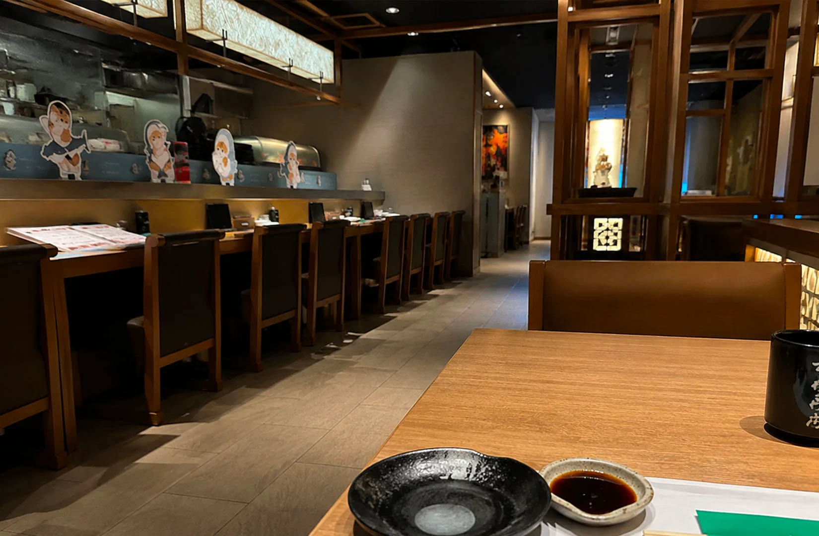 Sushi Tei Singapore modern Japanese restaurant interior with sushi counter seating