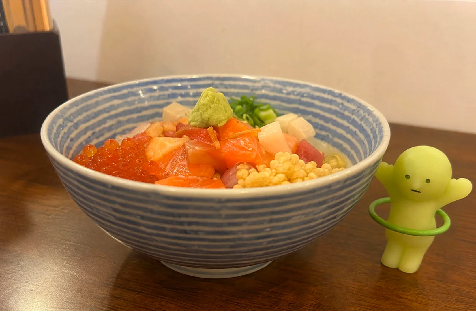 Koji Sushi Bar assorted sashimi rice bowl with salmon, tuna, ikura and wasabi
