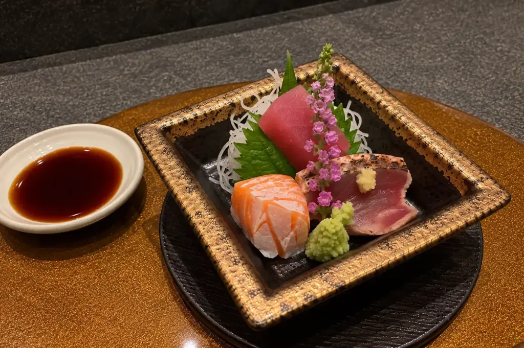 Assorted sashimi platter with salmon, tuna and seared fish